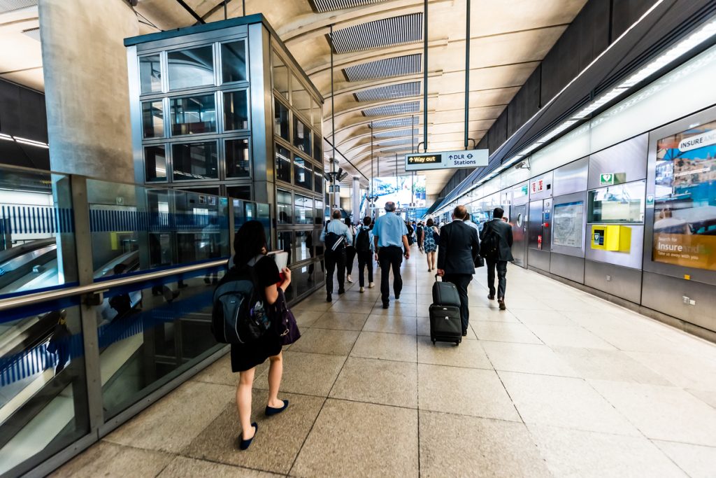 train or railway station with office goers or professionals