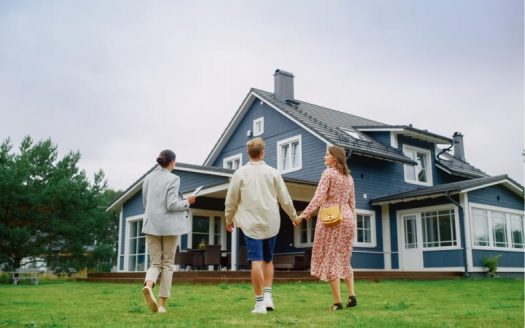 Real estate agent showing property to the couples