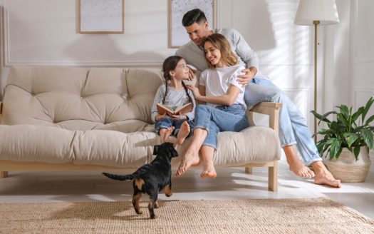 Happy family on sofa