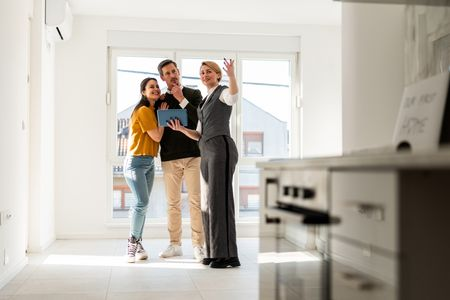estate agents showing house