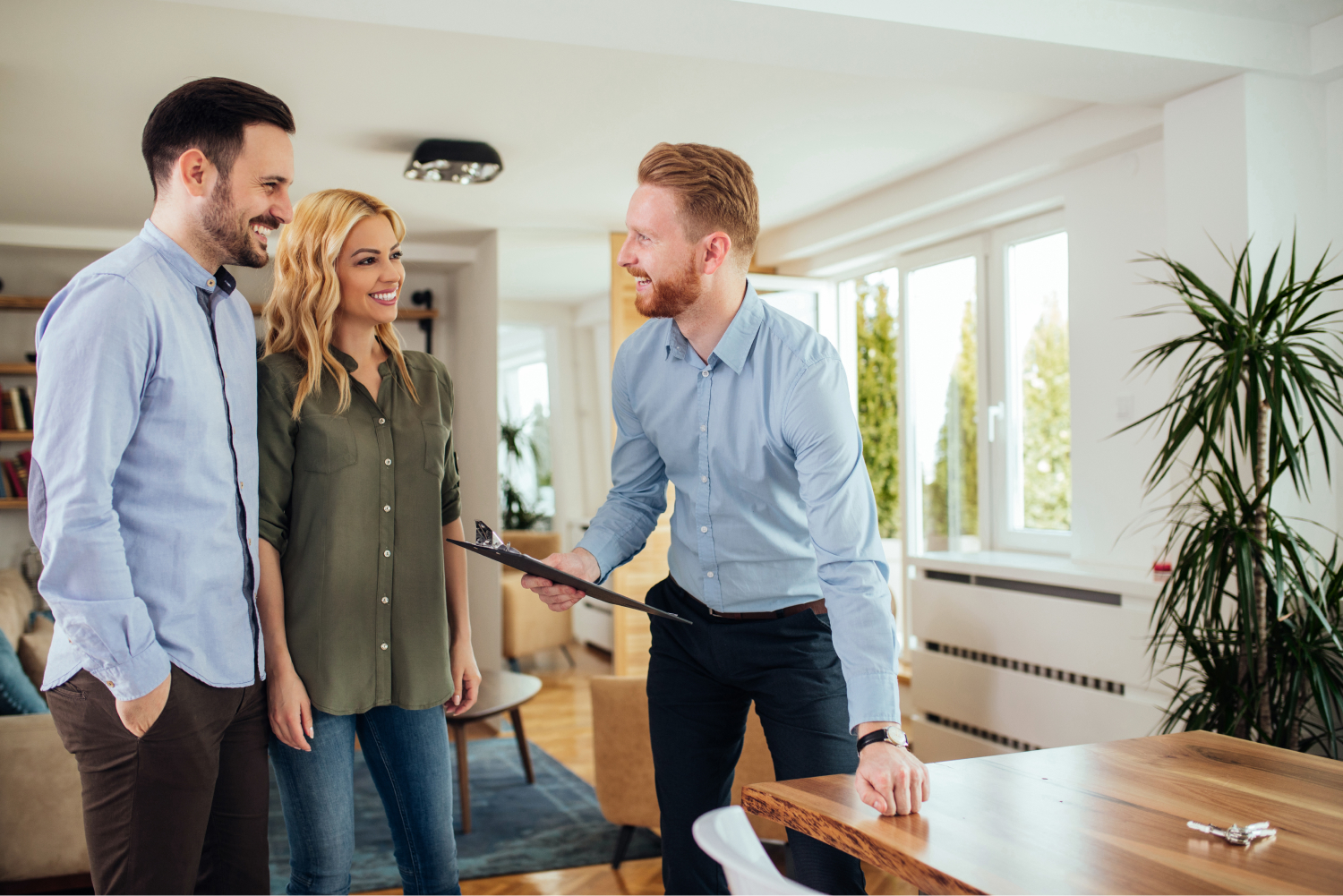Real estate agent speaking with buyers